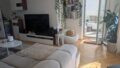 Wohnzimmer mit Blick auf Balkon